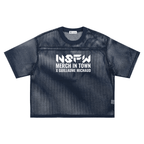 Blue mesh t-shirt with white text on a white background