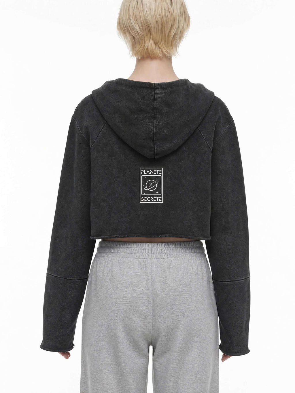 CLAiRE Vintage Washed Raw Edge Hoodie in Washed Black worn by a model, back view with back logo.