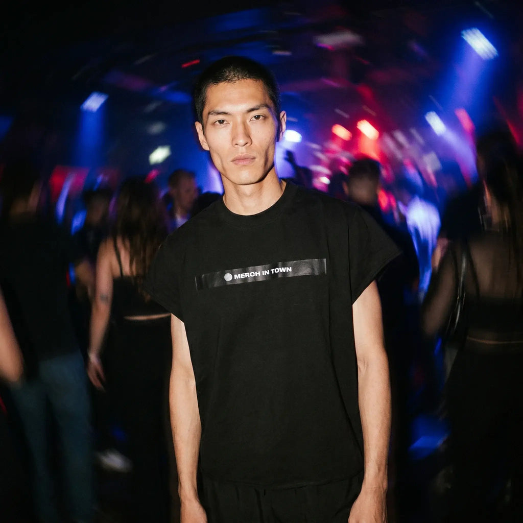 Merch in Town Boxy Raw Edge T-Shirt in Black, front lifestyle shot
