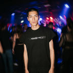 Merch in Town Boxy Raw Edge T-Shirt in Black, front lifestyle shot