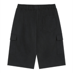 Merch in Town Drawstring Cargo Shorts in Black on a white background, back view.