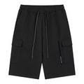 Merch in Town Drawstring Cargo Shorts in Black on a white background, front view.