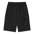 Merch in Town Drawstring Cargo Shorts in Black on a white background, front view.