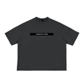 Merch in Town Classic Loose Boxy Tee in Black on a white background, front view.