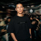 Merch in Town Classic Loose Boxy Tee in Black, front lifestyle shot