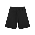 Merch in Town Men's Solid Elastic Waist Shorts in Black on a white background, back view.
