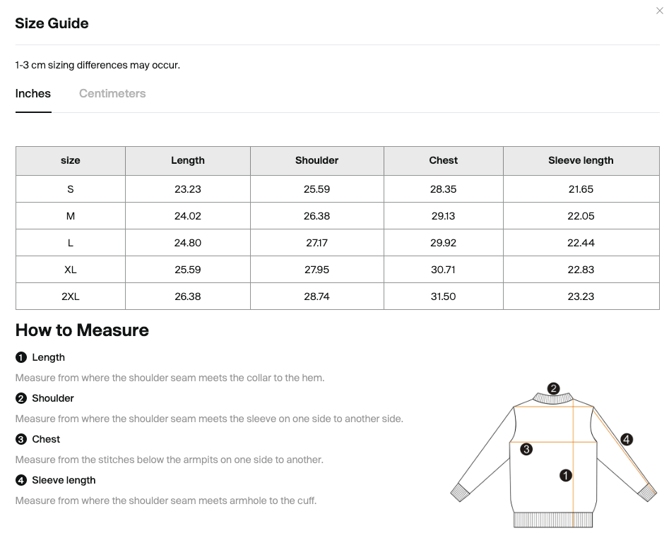 Size chart for the Merch in Town Essential Oversized Boxy Fit Fleece Hoodie with measurements in inches and centimeters.