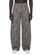 Merch in Town Vintage Wash Leopard Wide Leg Jeans in Leopard Gray, front view on model.