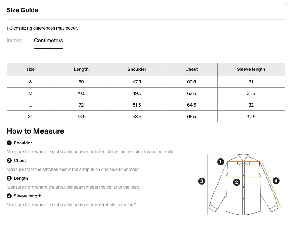 Size chart for the Merch in Town Vintage Wash Drop Shoulder Lyocell Shirt with measurements in inches and centimeters.