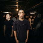 Merch in Town Mineral Wash Boxy T-Shirt in Dark Purple, front lifestyle shot