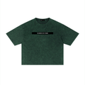 Merch in Town Mineral Wash Boxy T-Shirt in Dark Green on a white background, front view.