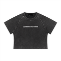 Merch in Town Women's Mineral Wash Raglan Crop T-Shirt in Black on a white background, front view.