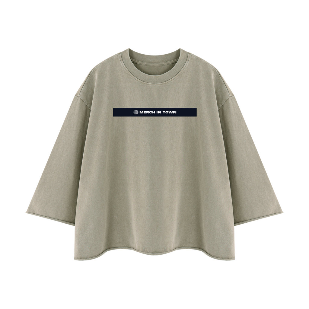 Merch in Town Mineral Wash Raw Hem Boxy T-Shirt in Apricot on a white background, front view.