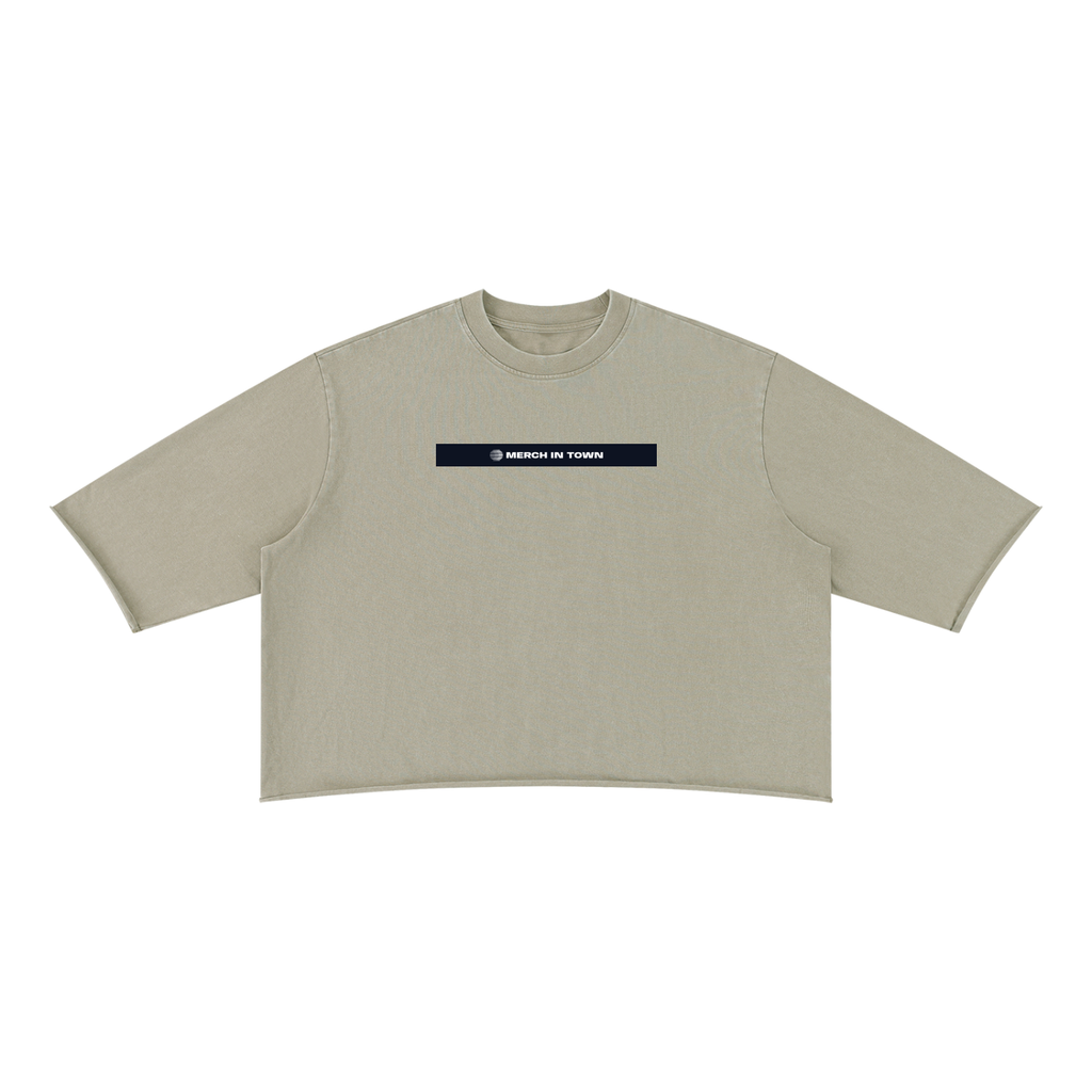 Merch in Town Mineral Wash Raw Hem Boxy T-Shirt in Apricot on a white background, front view.