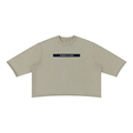 Merch in Town Mineral Wash Raw Hem Boxy T-Shirt in Apricot on a white background, front view.