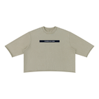 Merch in Town Mineral Wash Raw Hem Boxy T-Shirt in Apricot on a white background, front view.