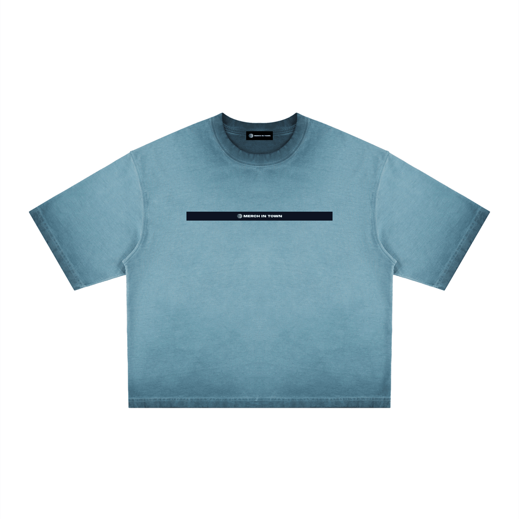 Merch in Town Reverse Dyed Boxy T-Shirt in Gray Blue on a white background, front view.