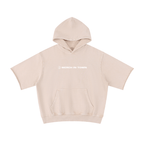 Merch in Town Mineral Wash Short Sleeve Hoodie in Apricot on a white background, front view.