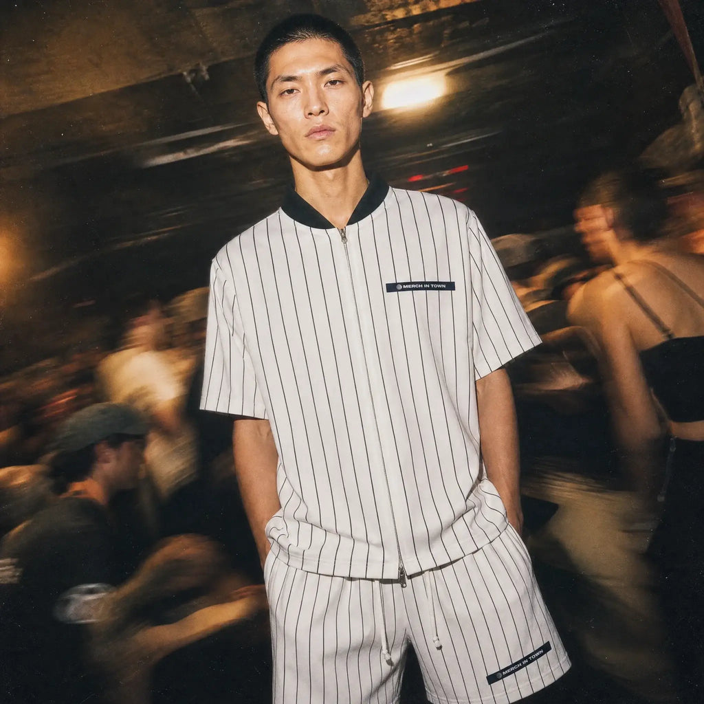 Merch in Town Striped Full-Zip Baseball Jersey in White, front lifestyle shot
