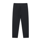 Merch in Town Lightweight Tapered Track Pants in Black on a white background, back view.