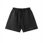 Merch in Town Vintage Wash Cotton Shorts in Black on a white background, front view.