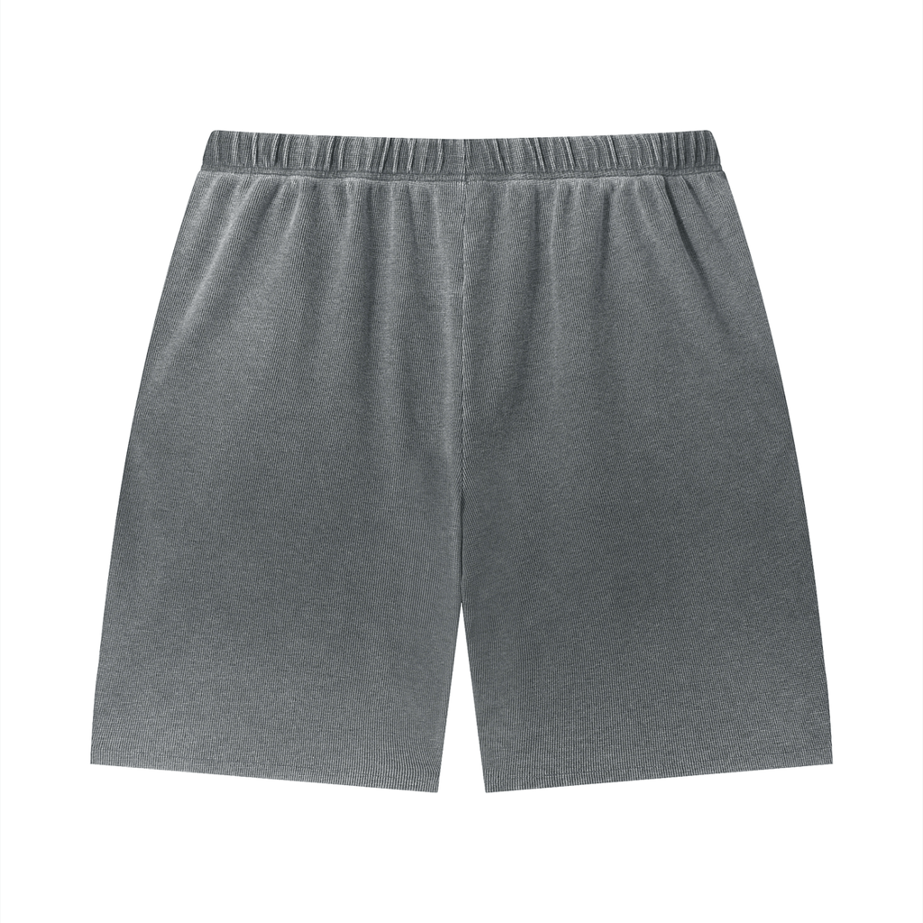 Merch in Town Vintage Wash Sunfade Waffle Raw Hem Shorts in Dark Gray on a white background, back view.