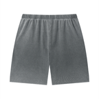 Merch in Town Vintage Wash Sunfade Waffle Raw Hem Shorts in Dark Gray on a white background, back view.