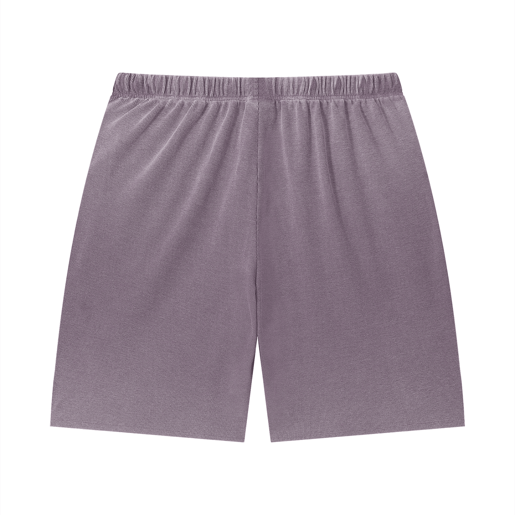Merch in Town Vintage Wash Sunfade Waffle Raw Hem Shorts in Plum Purple on a white background, back view.