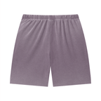 Merch in Town Vintage Wash Sunfade Waffle Raw Hem Shorts in Plum Purple on a white background, back view.