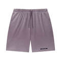 Merch in Town Vintage Wash Sunfade Waffle Raw Hem Shorts in Plum Purple on a white background, front view.