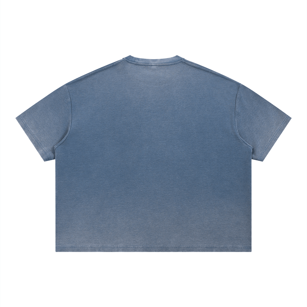Merch in Town Vintage Wash Sunfade Boxy Waffle T-Shirt in Blue on a white background, back view.