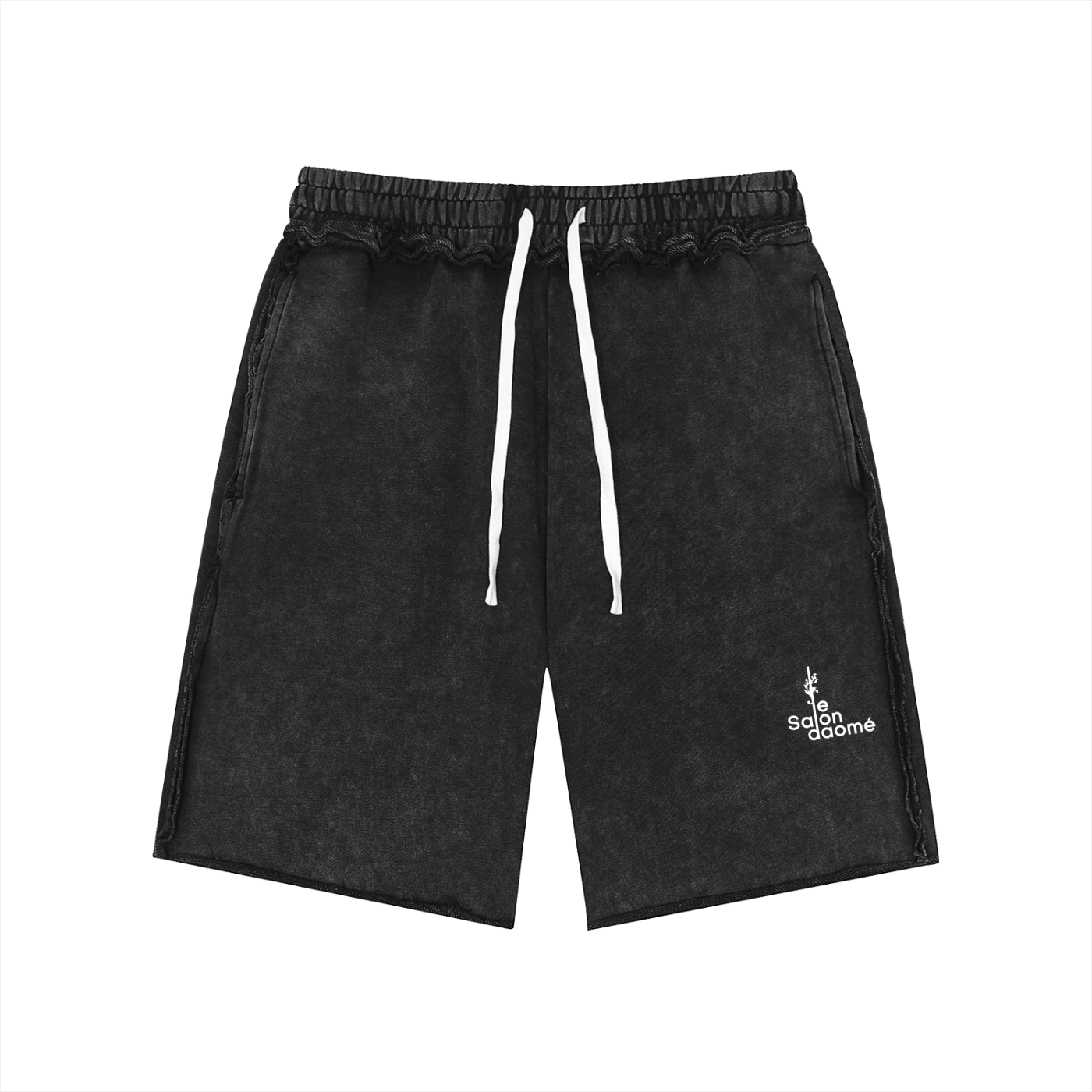 Salon Daomé black mineral wash raw edge shorts on a white background, front view.