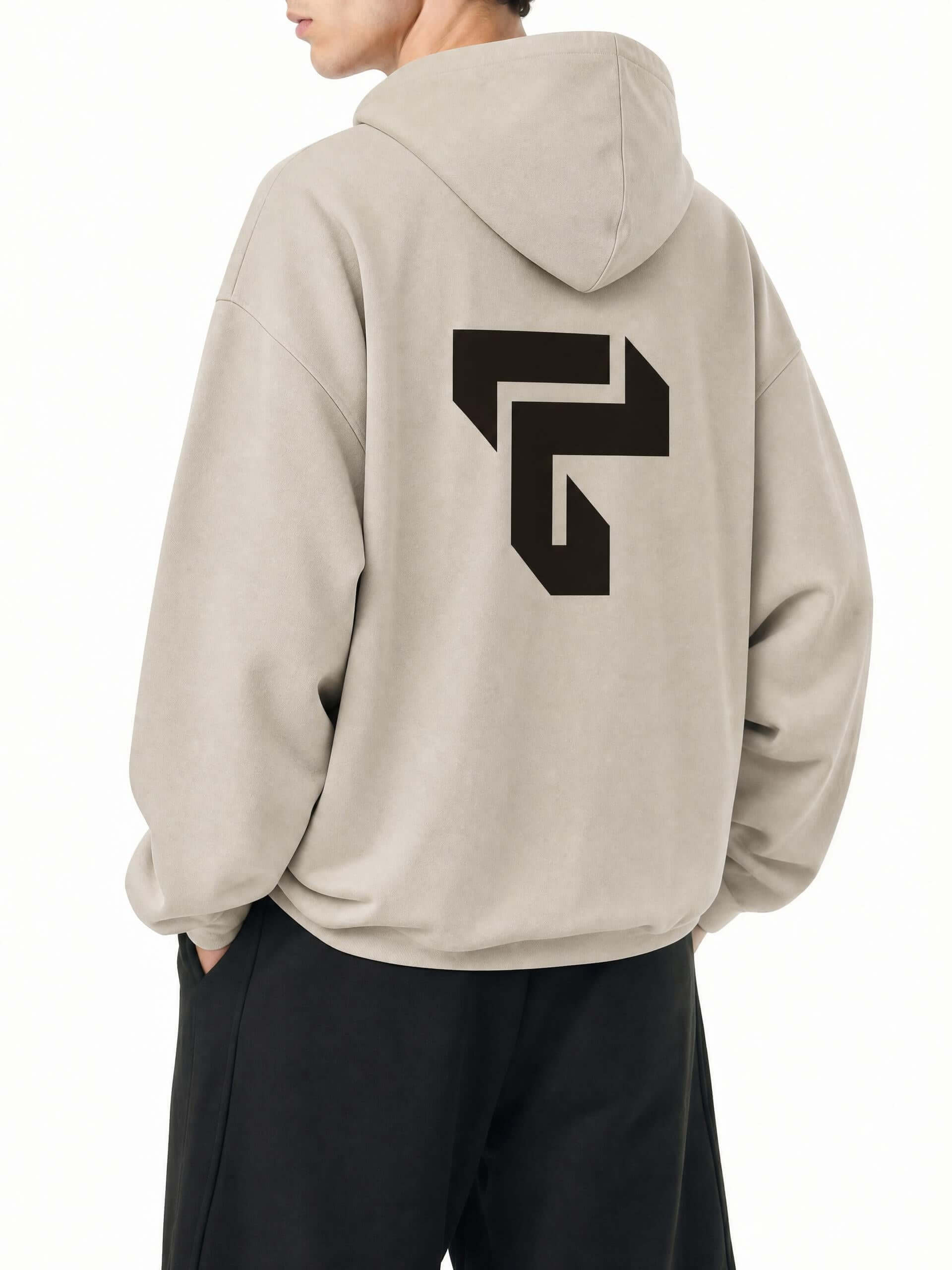 Teeto Boxy Gather-Hem Hoodie in Khaki worn by a model, back view with back logo.