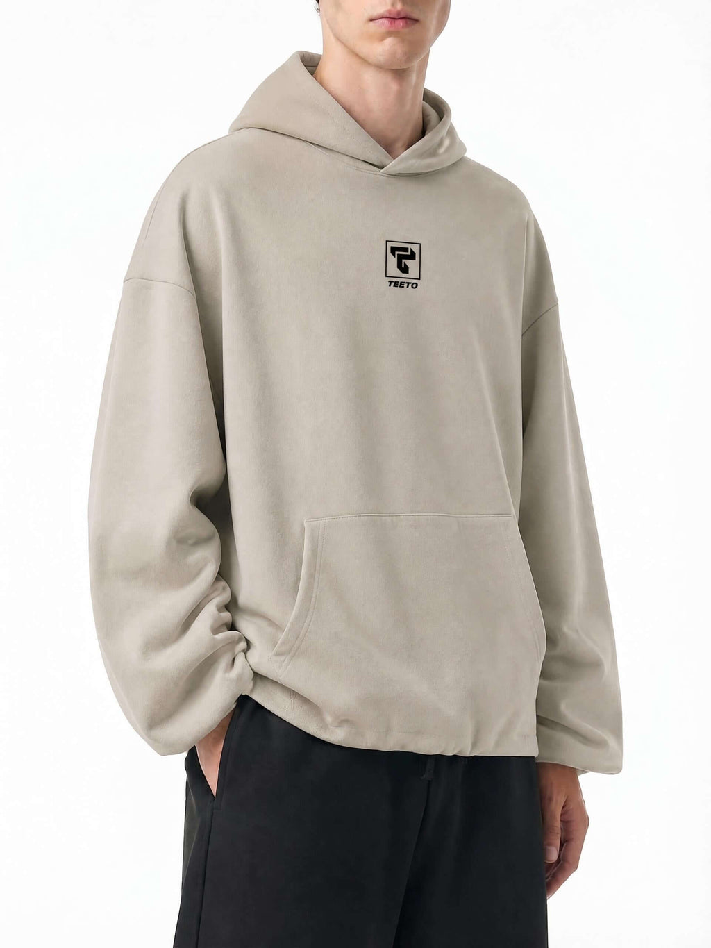 Teeto Boxy Gather-Hem Hoodie in Khaki, front three-quarter view.