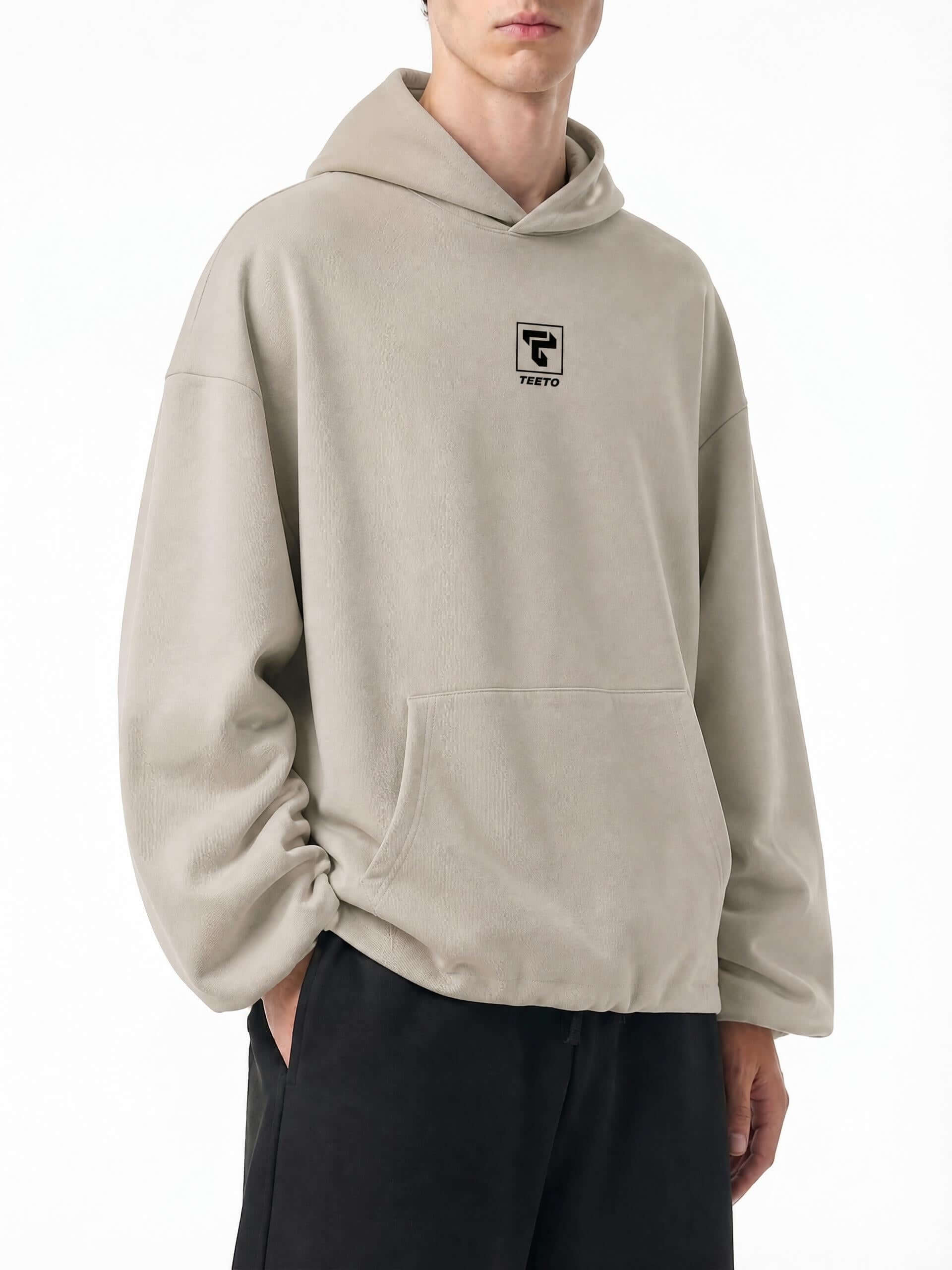 Teeto Boxy Gather-Hem Hoodie in Khaki, front three-quarter view.