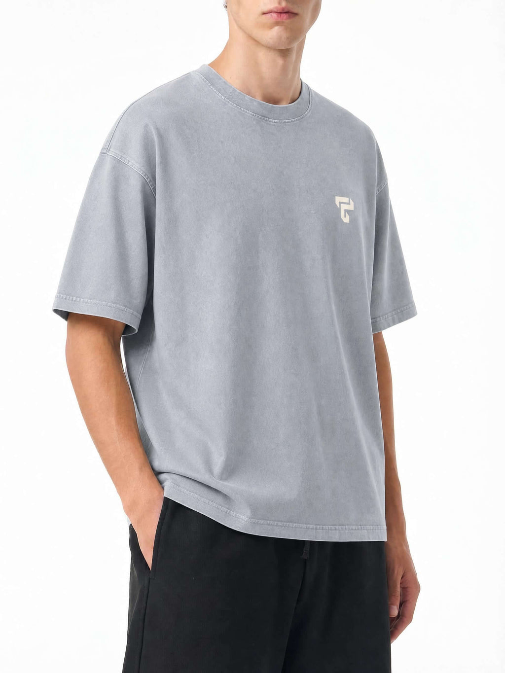 Teeto Mineral Wash Boxy Cotton T-Shirt in Light Gray worn by a model, front three-quarter view, alternate.