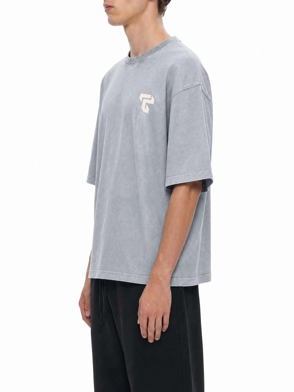 Teeto Mineral Wash Boxy Cotton T-Shirt in Light Gray worn by a model, front three-quarter view.