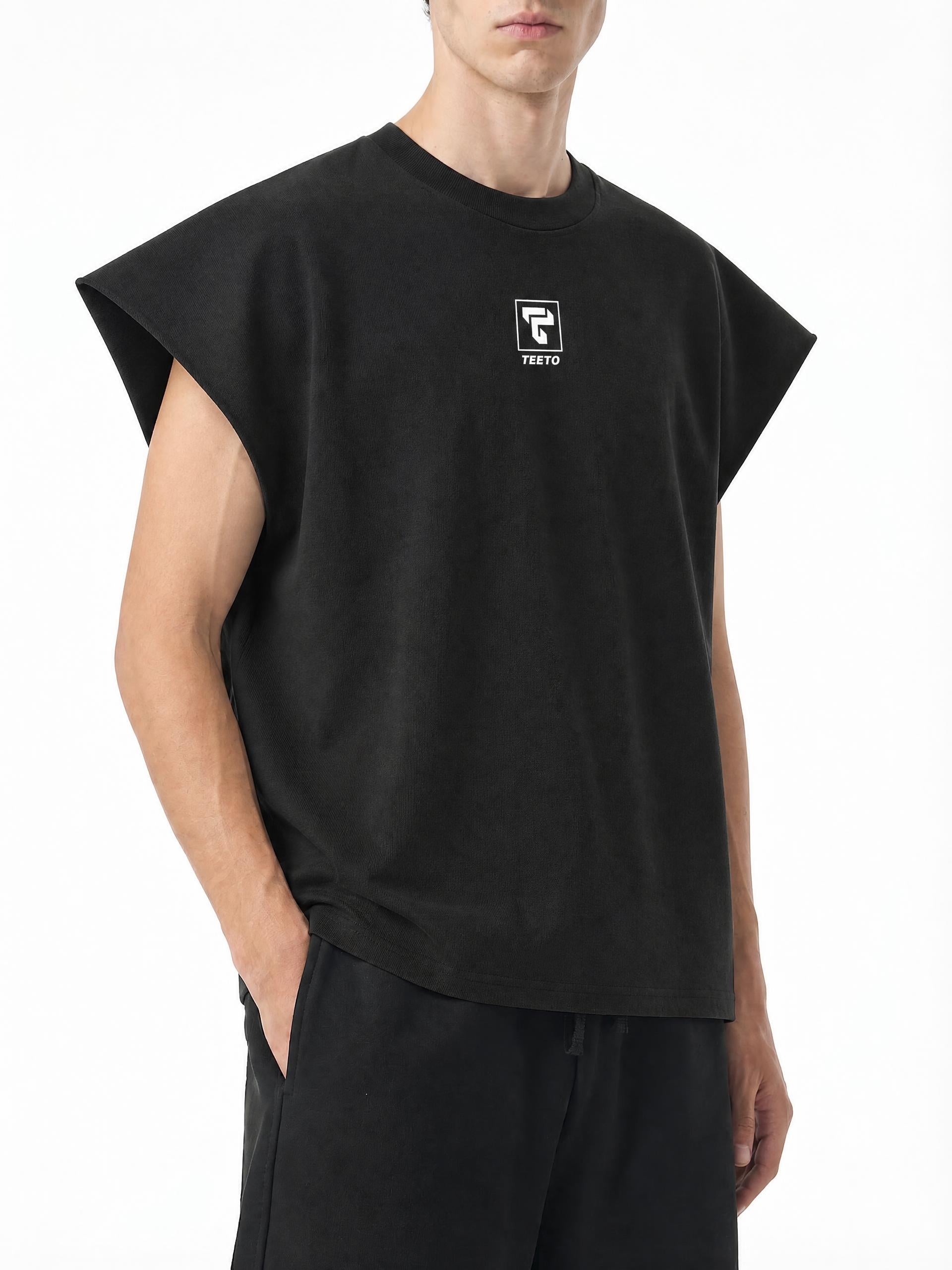 Teeto Raw Edge Boxy Non-Shrink T-Shirt in Black worn by a model, front view.