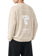 Teeto Waffle Raw Edge T-Shirt in Apricot worn by a model, back view with TEETO back logo.
