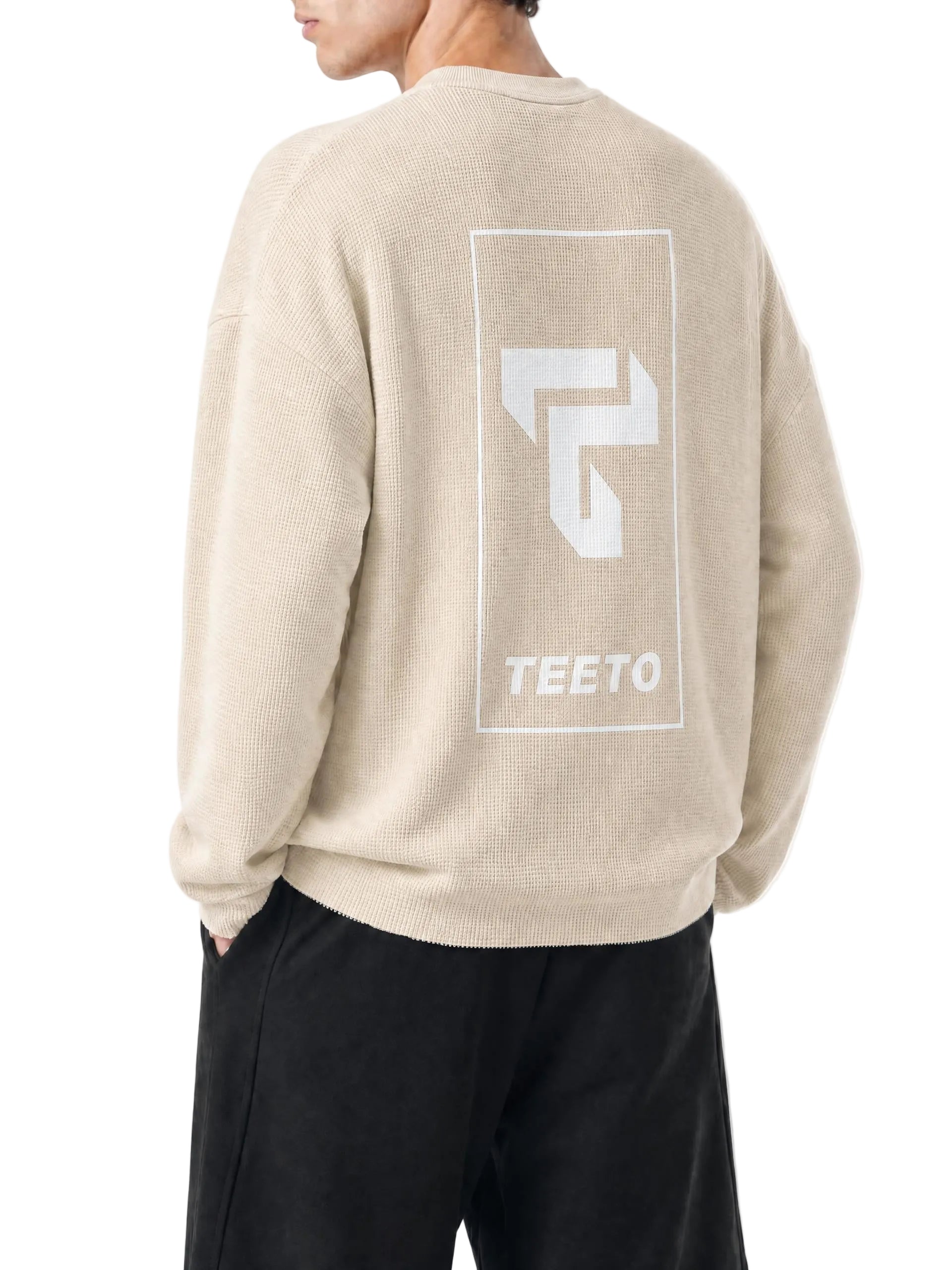 Teeto Waffle Raw Edge T-Shirt in Apricot worn by a model, back view with TEETO back logo.