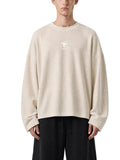 Teeto Waffle Raw Edge T-Shirt in Apricot worn by a model, front view.