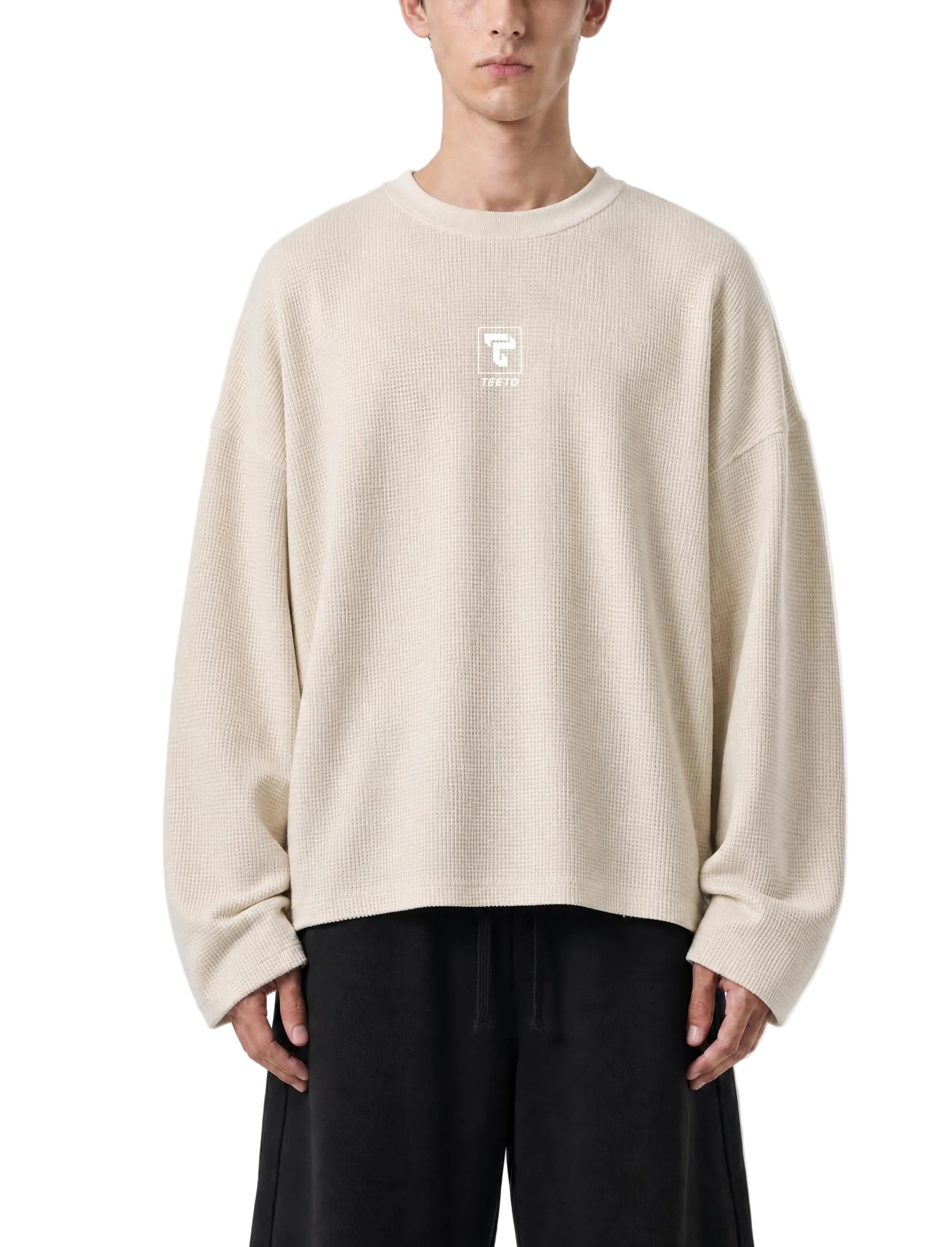 Teeto Waffle Raw Edge T-Shirt in Apricot worn by a model, front view.